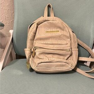 Cream Perforated Backpack